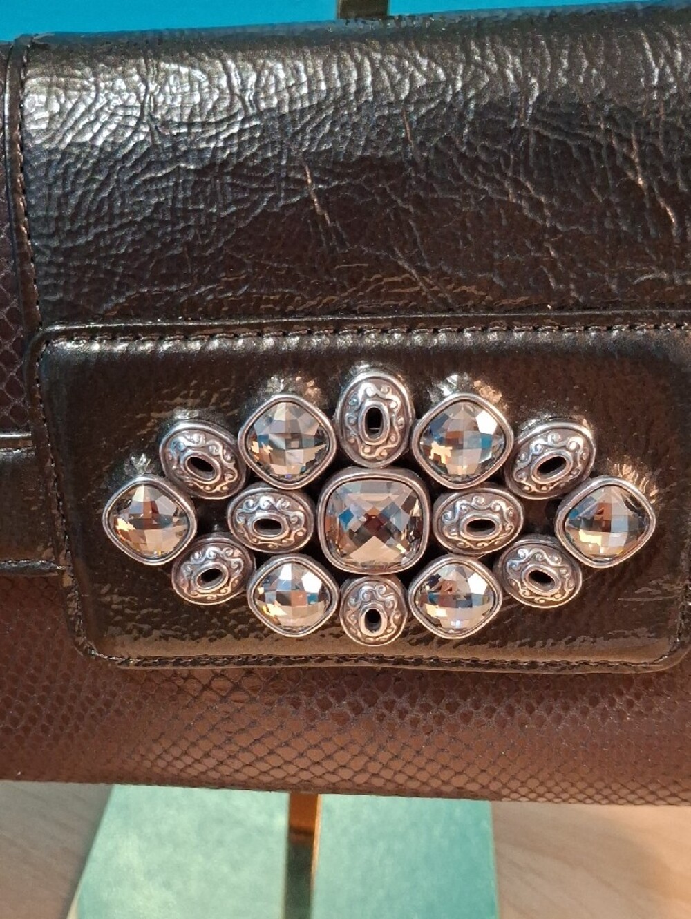 Brighton Bronze Snake Embossed Studded Clutch with Heart Charm - Picture 8 of 14